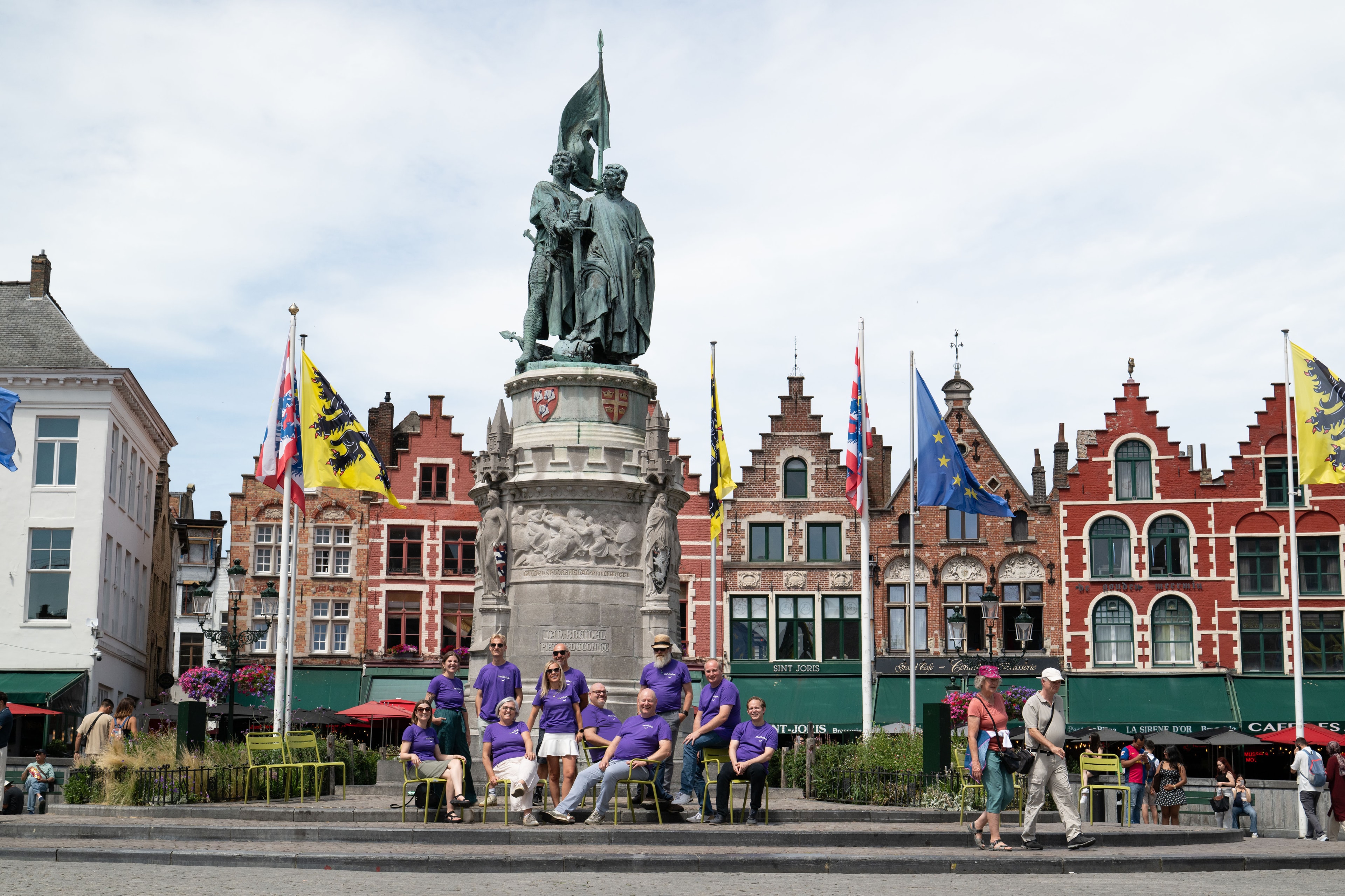 The Motisha team walking in Bruges